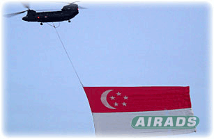 Skytaculair Helicopter Banner Singapore Flag Image